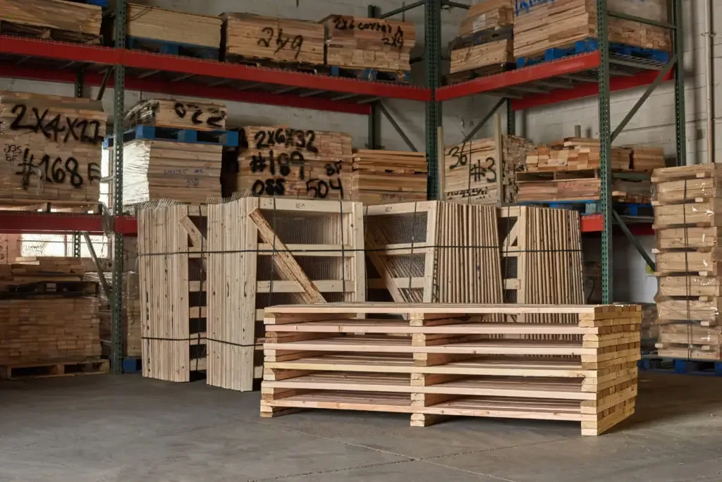 Wooden pallet boards and components in an industrial facility